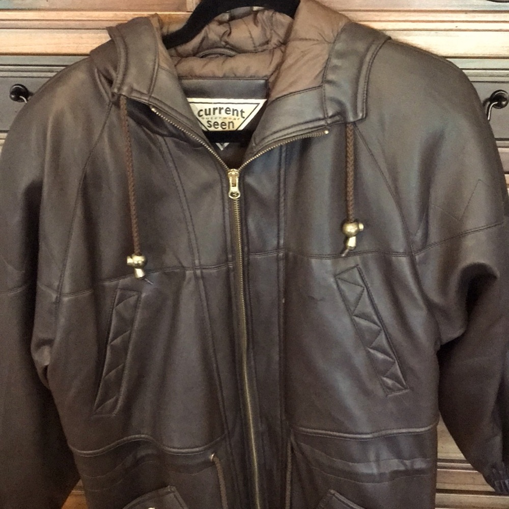 Brown polyvinyl hooded jacket. Looks and feels like real leather. Zip front